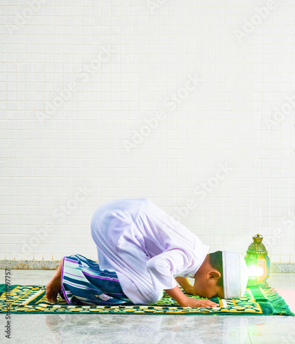 Muslim child worships and prays for Allah