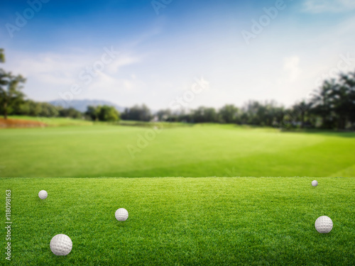 golf balls on green grass