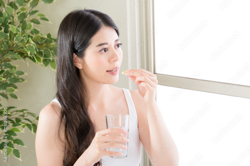 beautiful asian women healthy diet eating vitamin pill beautiful asian women healthy diet eating vitamin pill