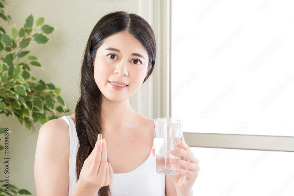 beautiful asian women healthy diet eating vitamin pill beautiful asian women healthy diet eating vitamin pill