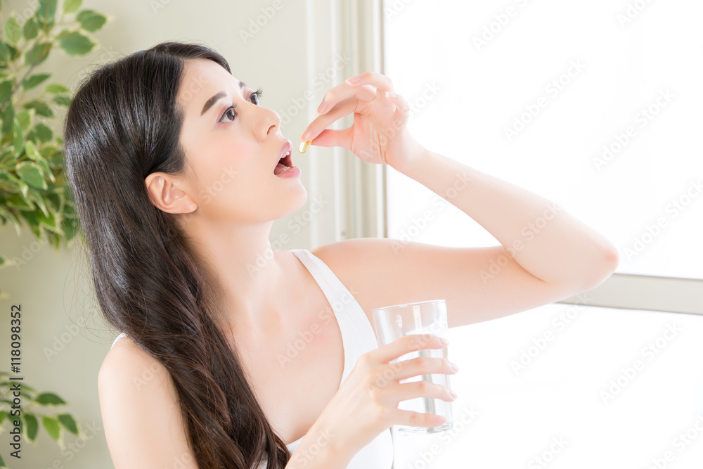 beautiful asian women healthy diet eating vitamin pill beautiful asian women healthy diet eating vitamin pill