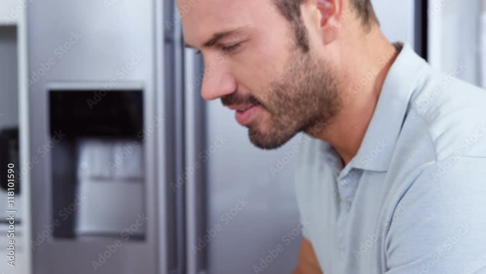 Smiling man using a tablet Smiling man using a tablet