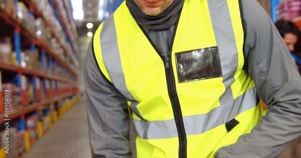 Warehouse worker posing in front of the camera