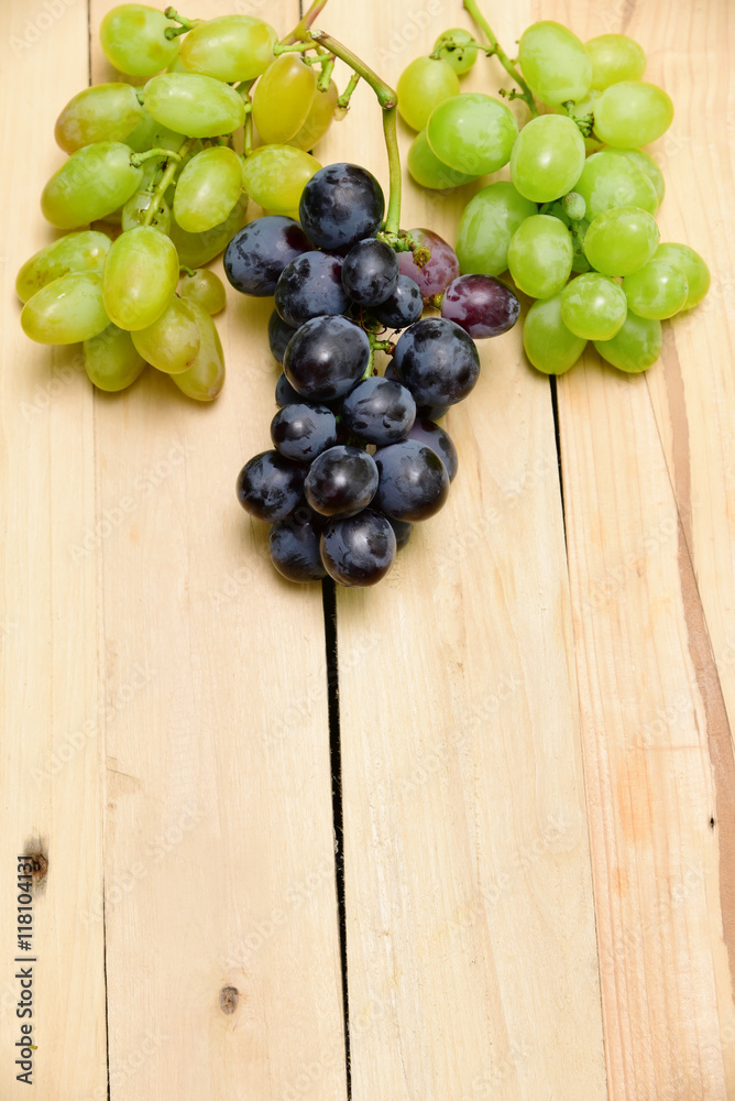 Rural still life frame concept. Blue and green grapes. Rural still life frame concept. Blue and green grapes.