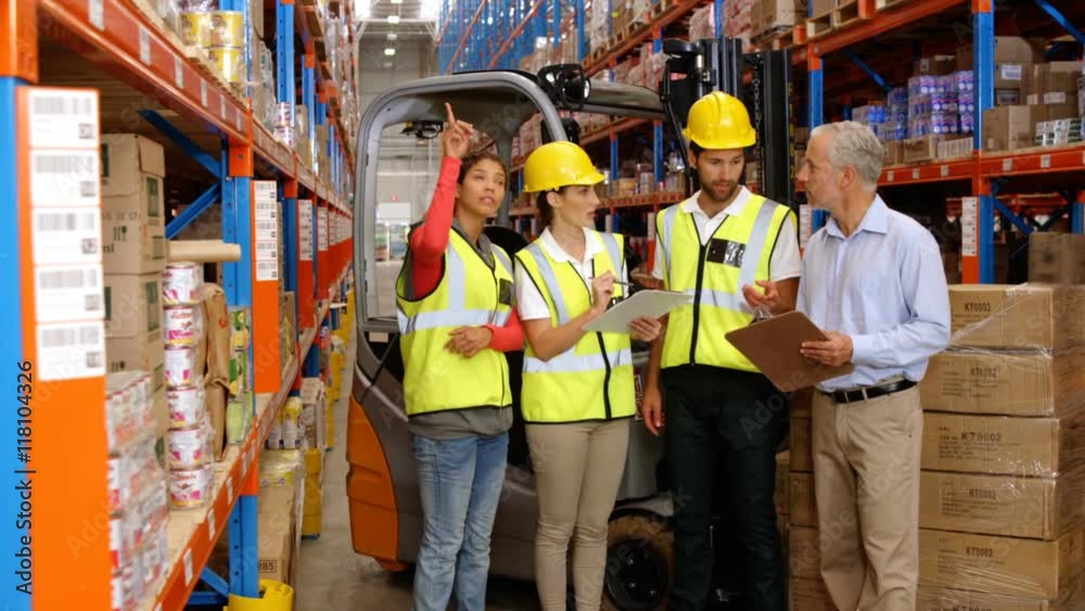 Warehouse workers working together Warehouse workers working together