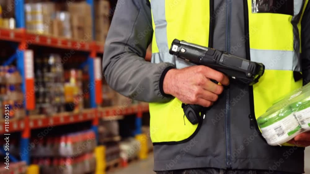 Warehouse worker using a scanner Warehouse worker using a scanner