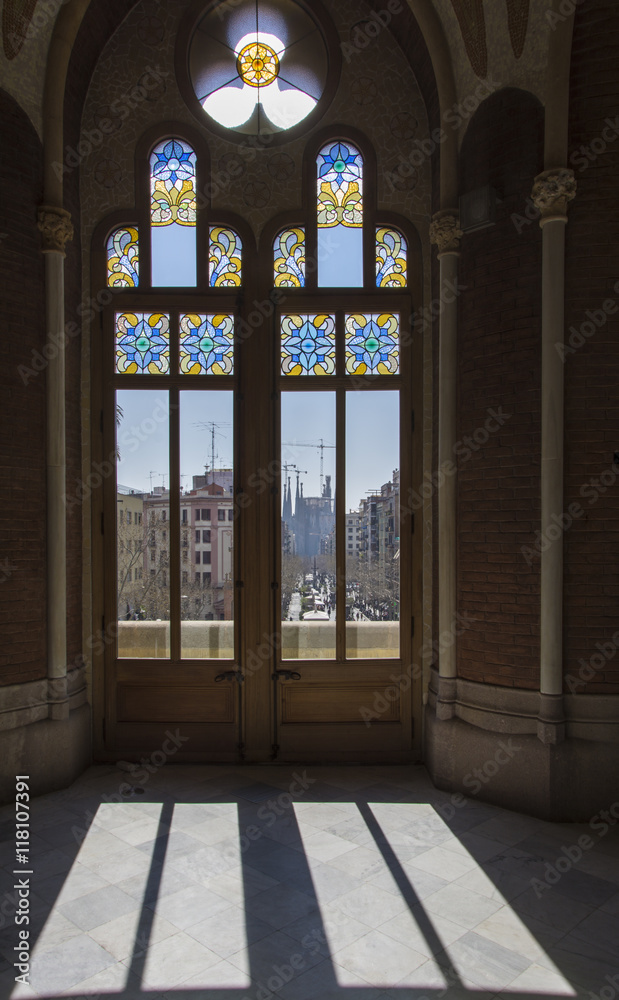 Famous Barcelona's Sagrada familia seen through the window