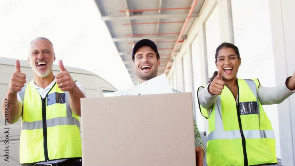 Warehouse workers posing together Warehouse workers posing together