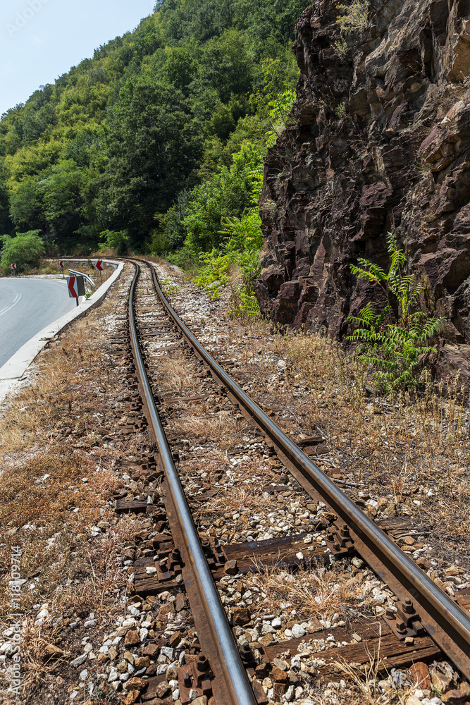 railroad tracks in the old worn wooden sleepers require urgent repair