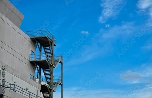 Fire escape of building against clear sky