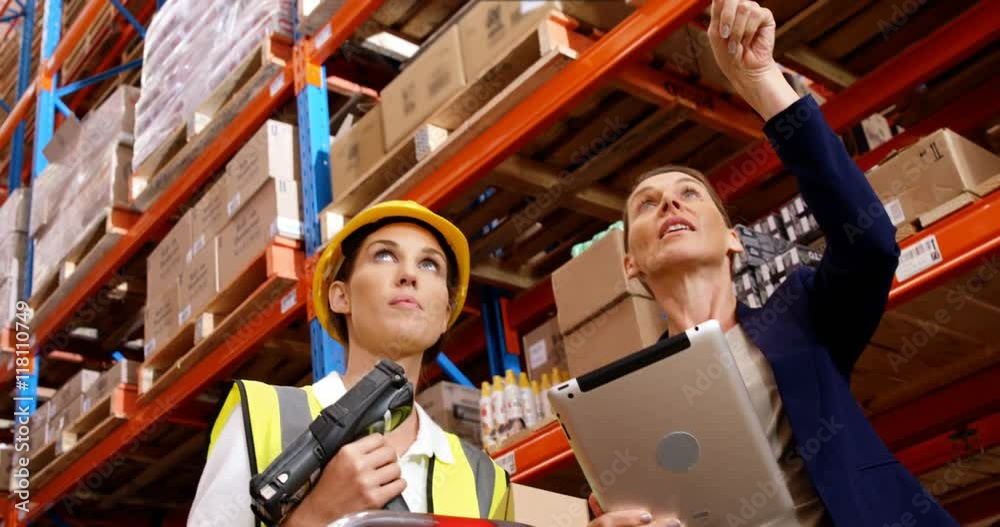 Manager showing something to worker