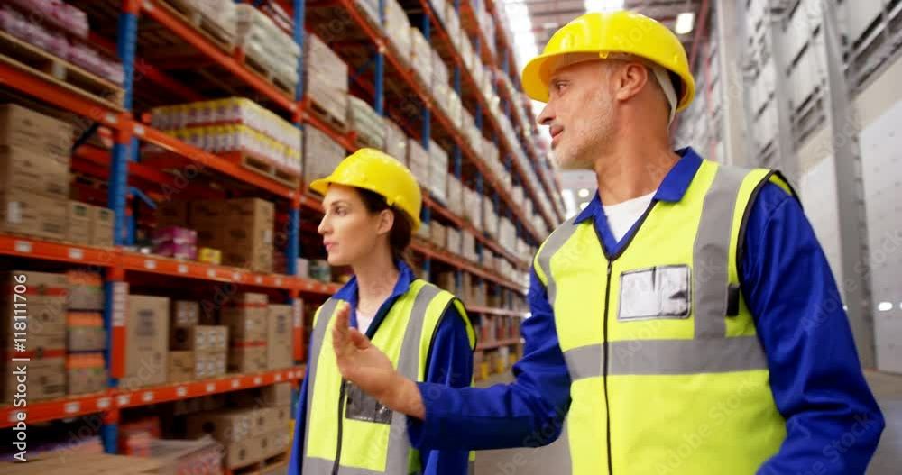 Warehouse worker walking and interacting Warehouse worker walking and interacting