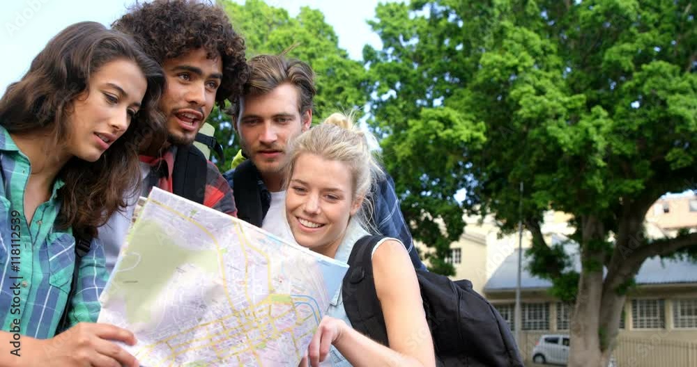 Friends looking at map Friends looking at map