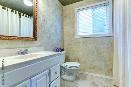 Classic bathroom interior with white vanity cabinet