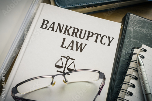 Bankruptcy law book. Justice and legislation concept. photo