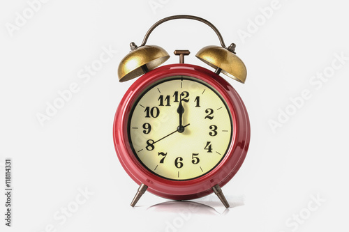 An image of a retro clock showing 08:00 am or pm.