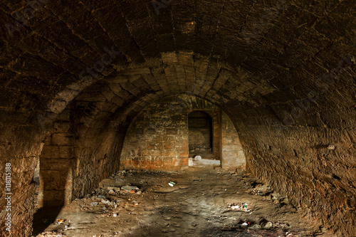 Old abandoned tunnel in the underground wine cellar. Entrance to © Aleksandr Lesik