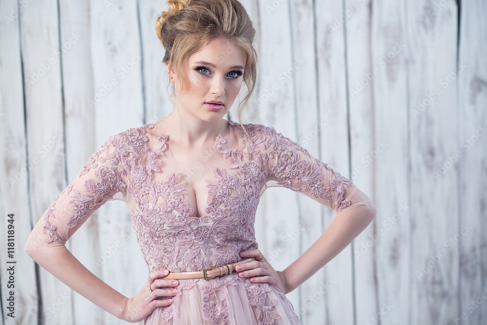 Fototapeta premium young beautiful bride with make-up and styling