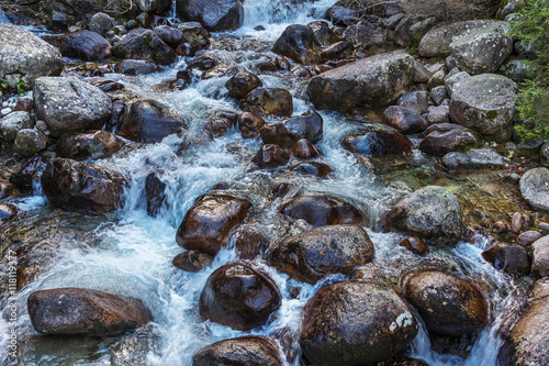 Beautiful bright contrasting mountain landscape. The  river photo