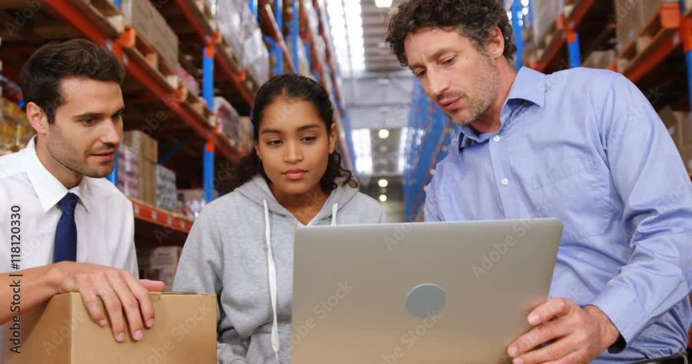 Warehouse workers working together Warehouse workers working together