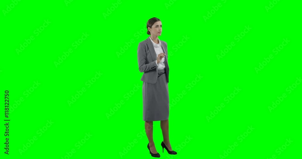 Businesswoman using a virtual touchscreen Businesswoman using a virtual touchscreen