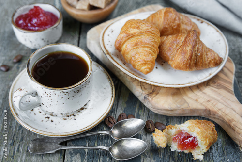 Morning coffee with a crois...