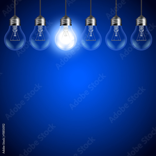 Light bulbs on dark blue background
