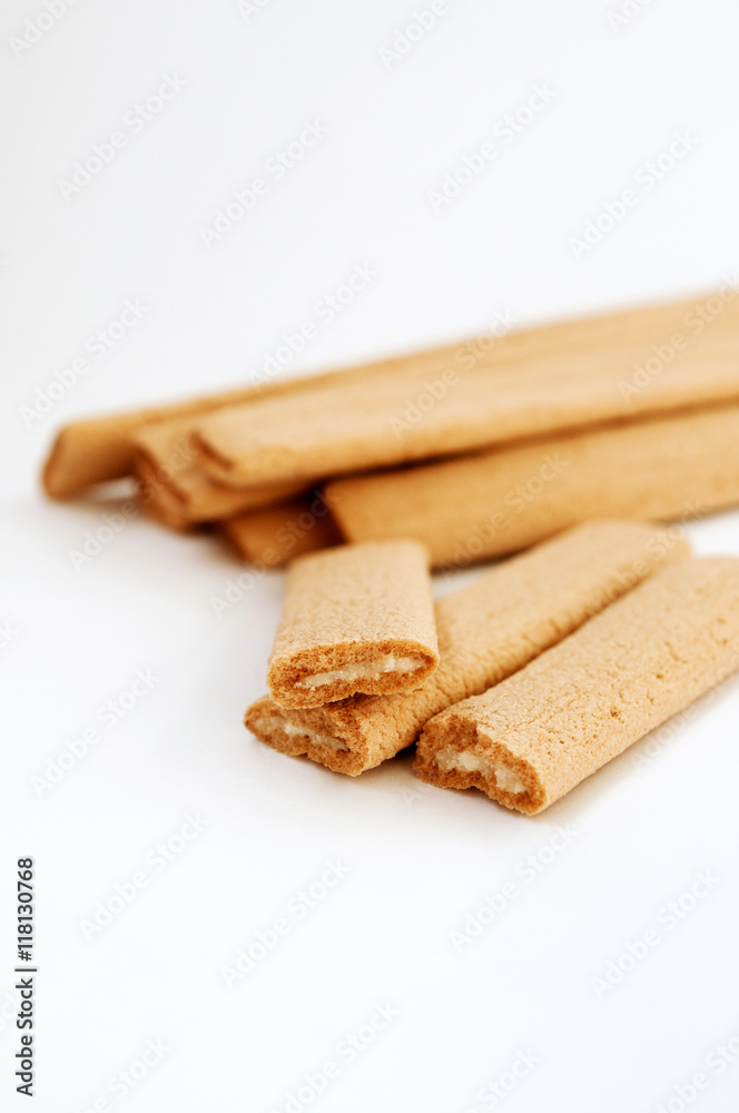 Biscuit sticks with filling on white background
Biscuit sticks with filling on white background