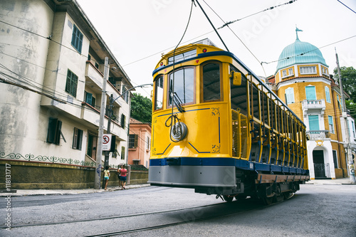 Iconic bonde tram travels along the streets of the tourist nieghborhood of Santa Teresa in Rio de Janeiro, Brazil 