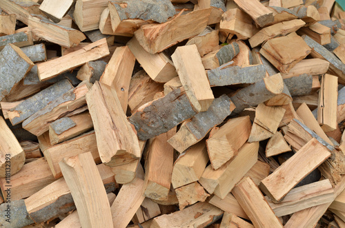 Pile of cut logs as a natural look background