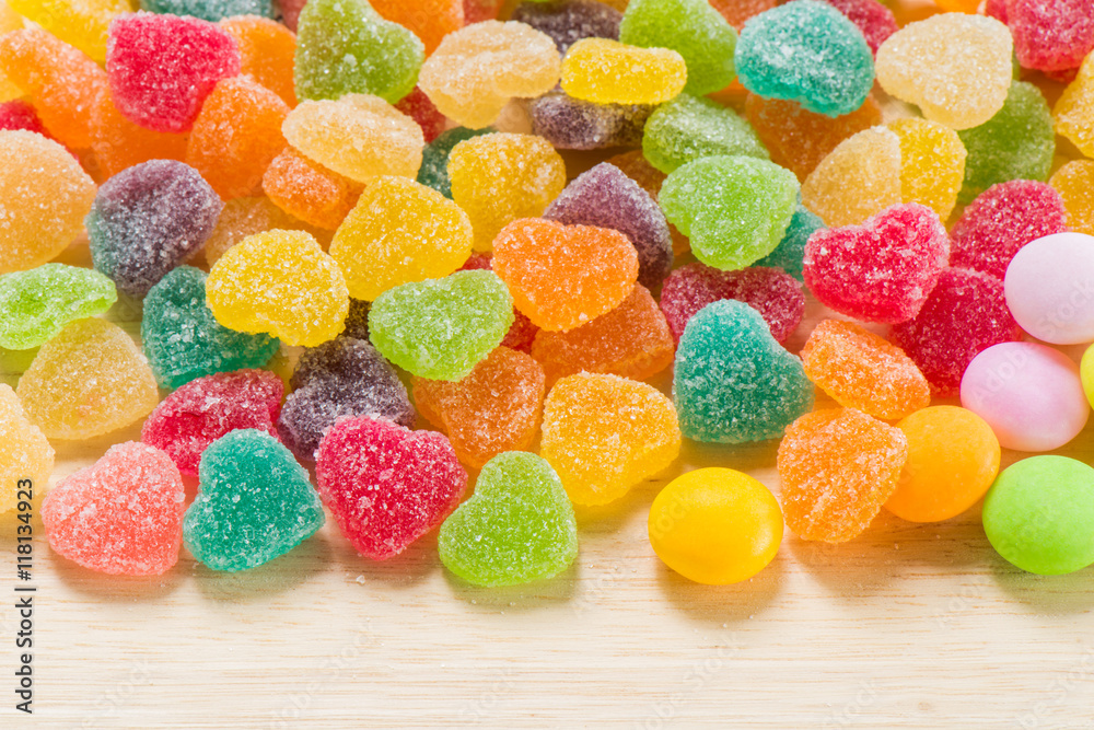 Colorful sugary candy heart shape background Colorful sugary candy heart shape background