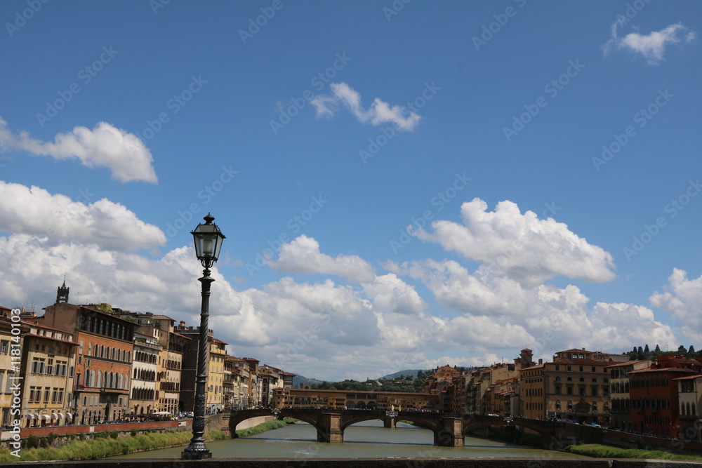 View from Ponte alla Carraia to Ponte Santa Trinita and Ponte Vecchio in Florence, Italy 
