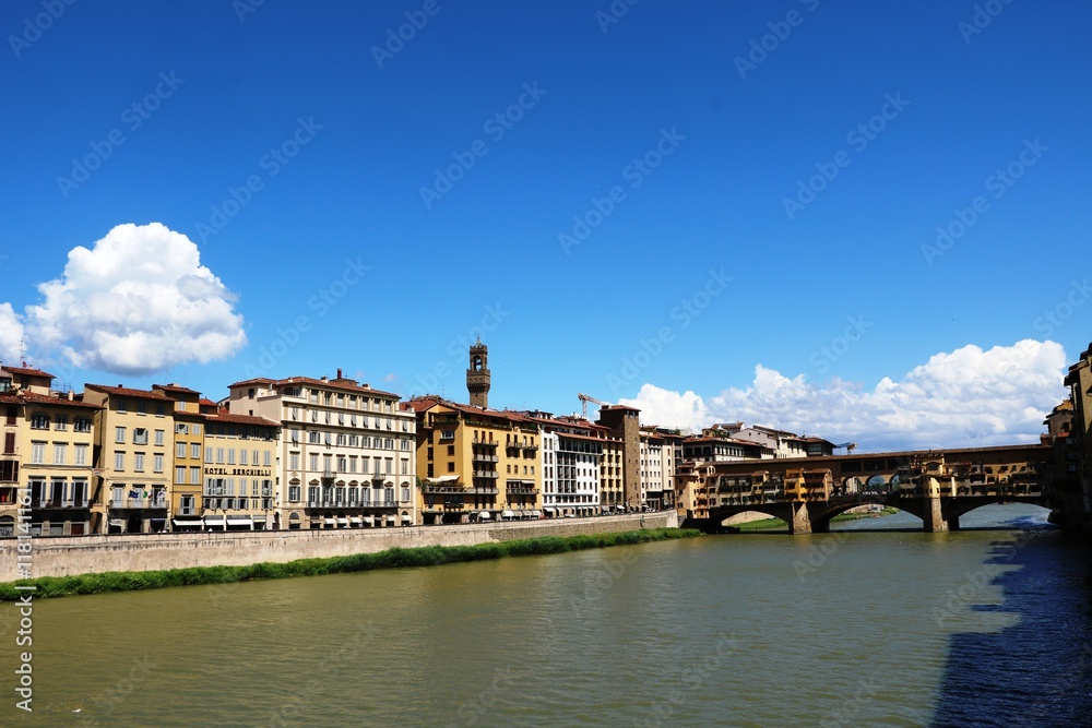 Naklejka premium View from Ponte Santa Trinita to Ponte Vecchio and River Arno in Florence, Tuscany Italy
