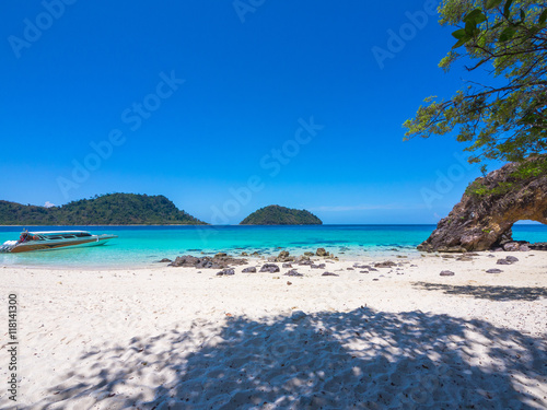 LIPE Island see Speed boat float in blue sea and mountain with white sand , Satun, Thailand