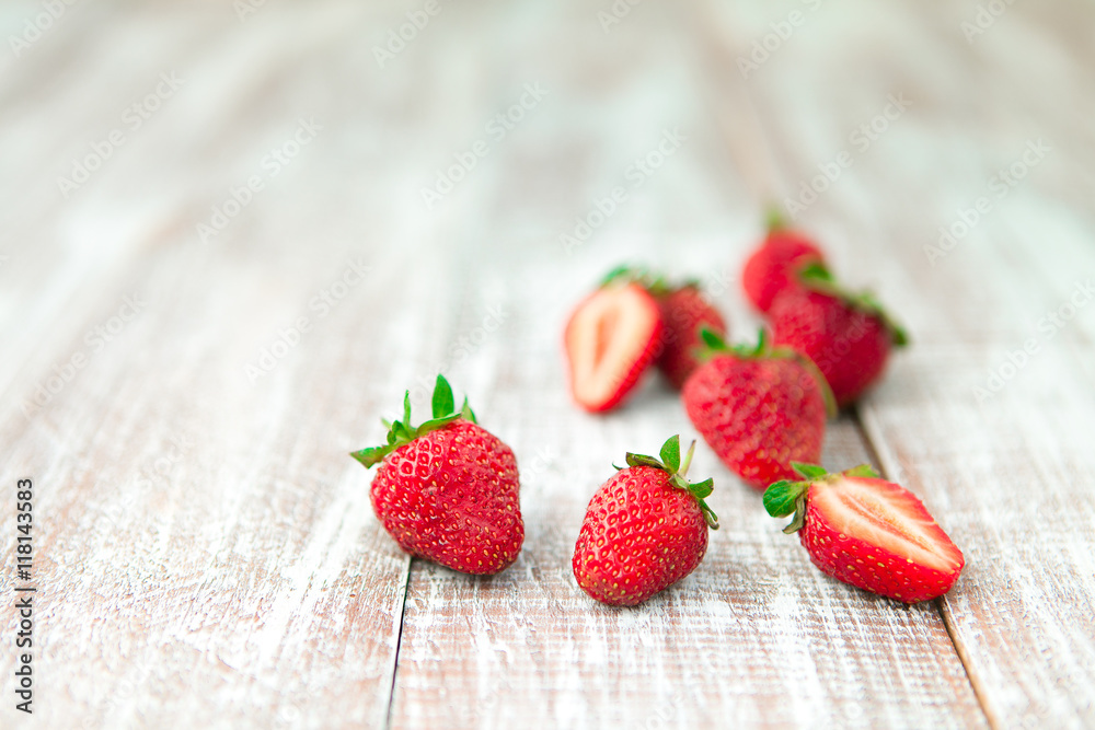 strawberry isolated on a wood background