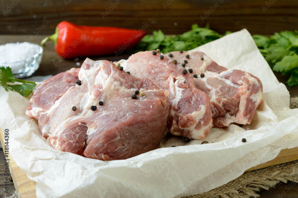 marinaded pork neck chops, uncooked marinaded pork neck chops, uncooked