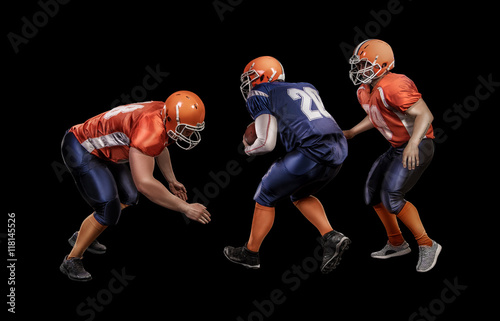 American football player running with ball during competitive game