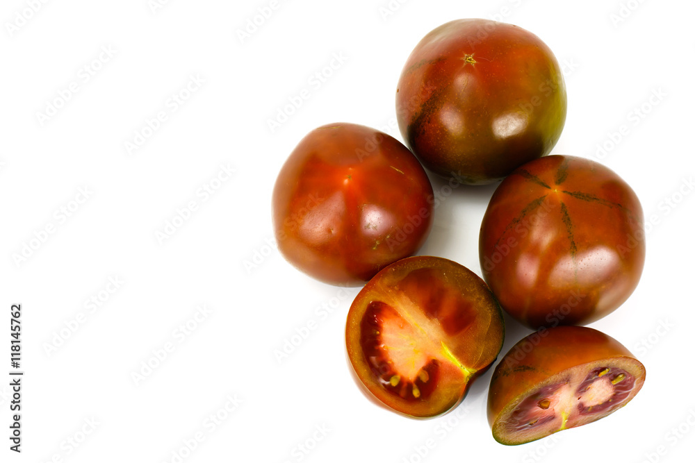Obraz premium Kumata Black Tomatoes Isolated on White Background