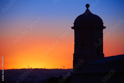St Peter and Paul Guard tower against backlight of the sunset, V