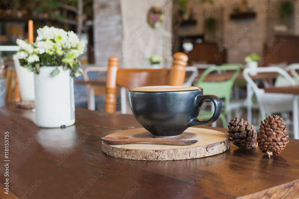 hot fresh coffee in white cup on wooden table spoon saucer white cream daisy flower in coffee shop cappuccino coffee mocha coffee espresso coffee latte coffee