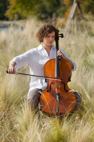 beautiful girl plays the cello