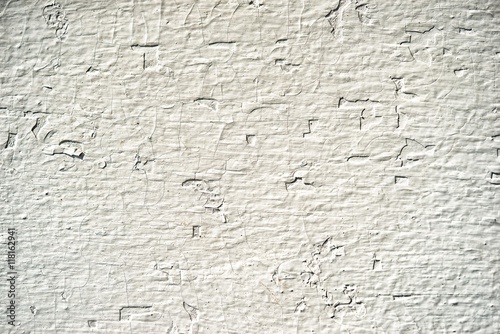 white wooden wall with depressed chaotic pattern  as a neutral background for business presentations