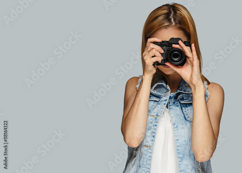 Portrait of blond female photographer.