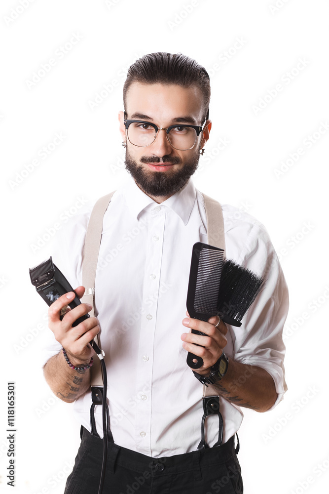 stylish hairdressers in the studio with the machine to shave and stylish hairdressers in the studio with the machine to shave and