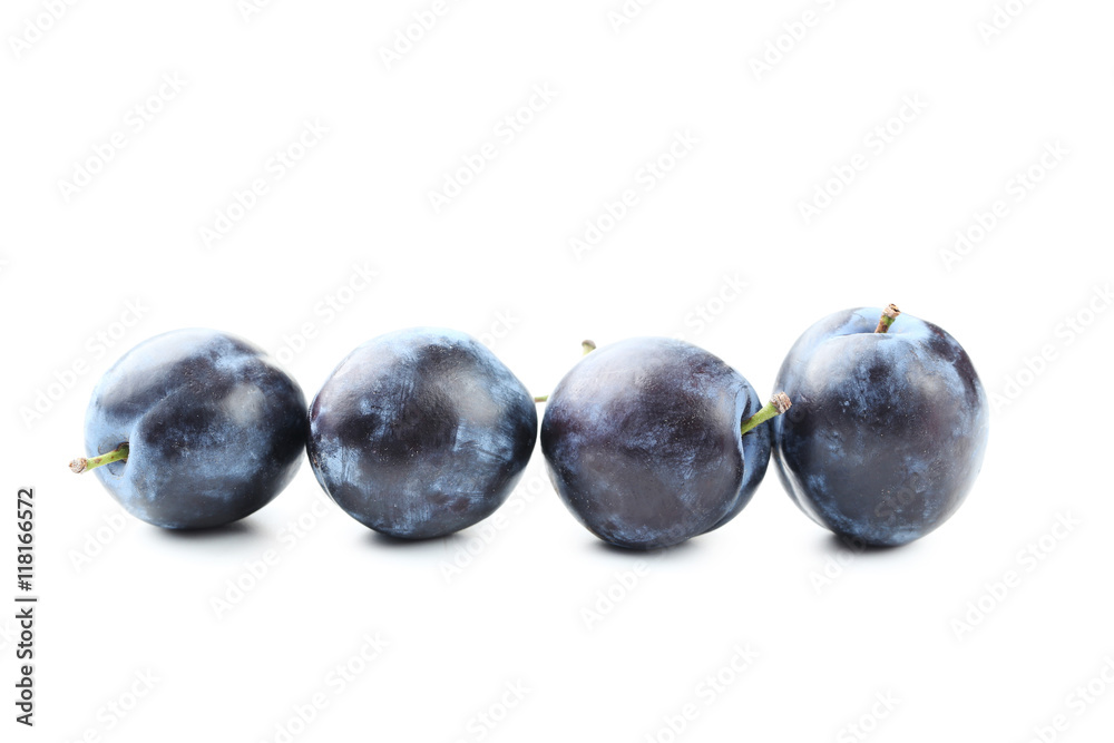 Tasty and ripe plums isolated on a white Tasty and ripe plums isolated on a white