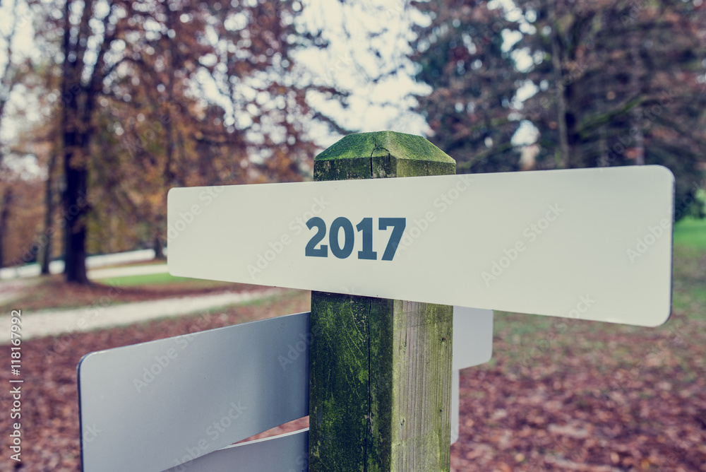 2017 on a rural sign board in an autumn park
