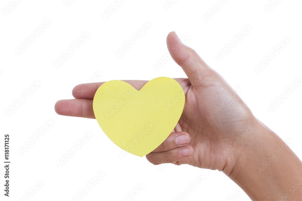 A female hand holding paper heart, isolated on white background. with using path A female hand holding paper heart, isolated on white background. with using path