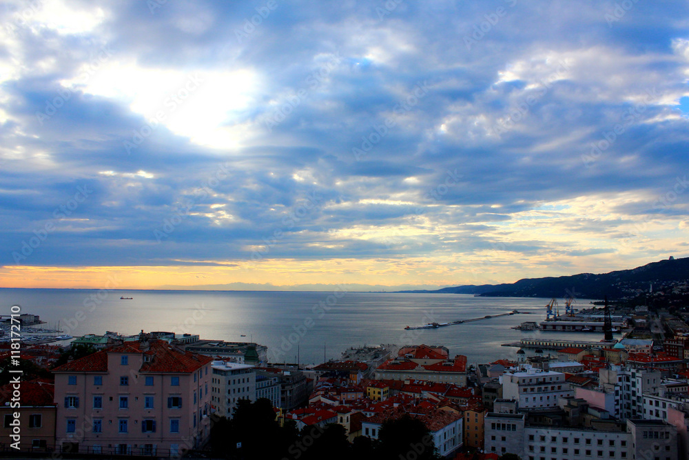 A landscape of Trieste city in Italy with sea and port view at a