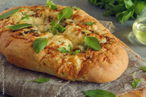 Focaccia with onions, herbs and cheese.