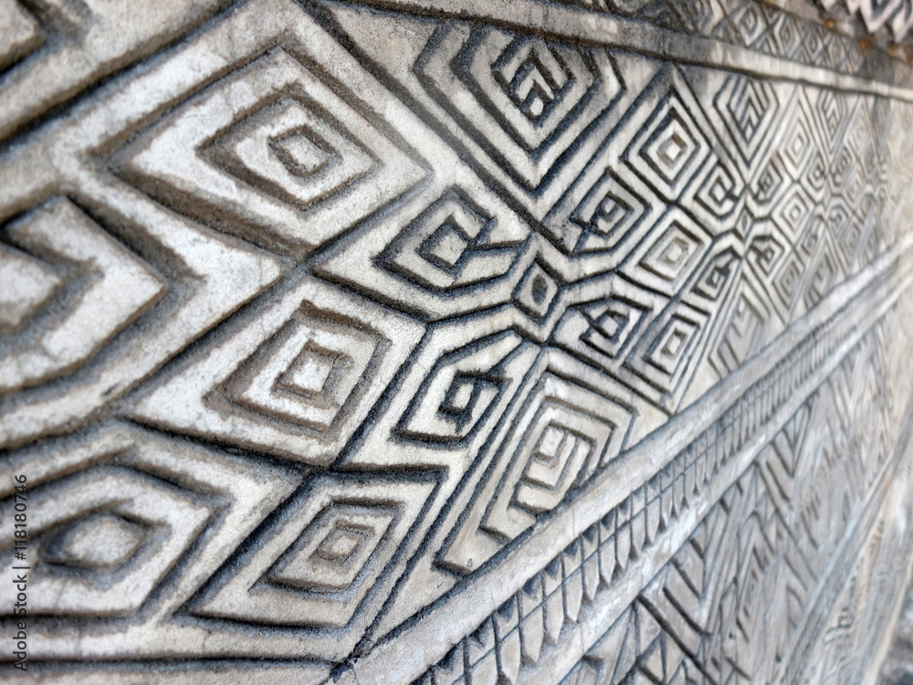 Images ancient stone wall texture in at Sala Kaeo Kou (Wat Khaek